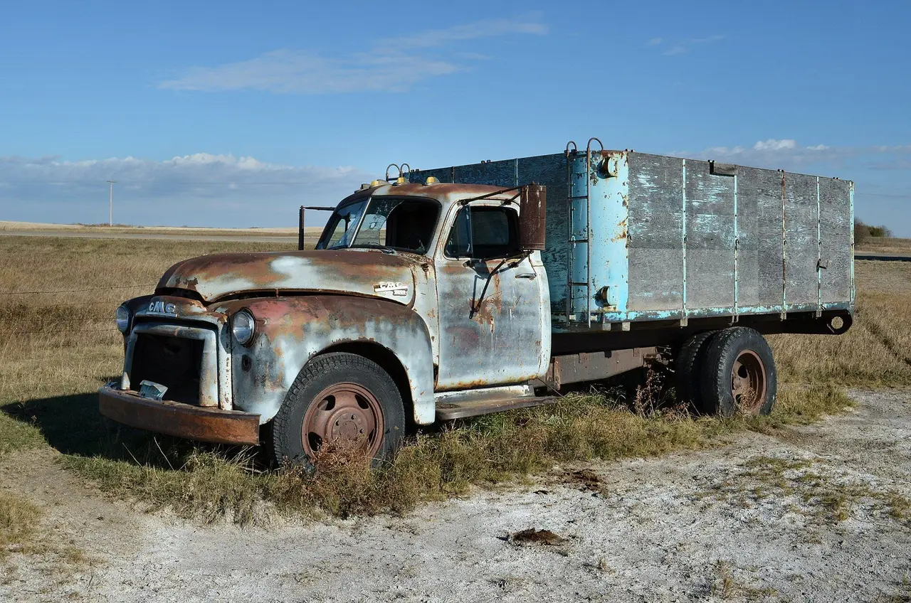 Abandoned GMC grain truck on the prairie, 2011